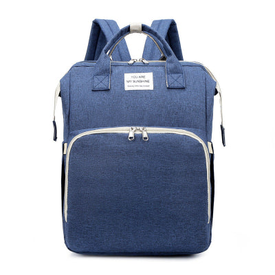 Sac à dos à langer lit voyage bleu