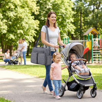 Sac à langer bandoulière ultra-organisé maman bébé grande sœur promenade parc