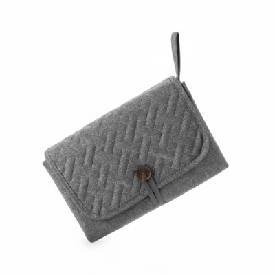 Tapis à langer nomade compact élégant gris